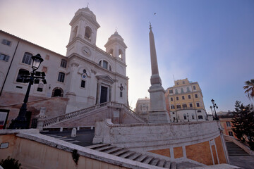 Wall Mural - The church of the Santissima Trinità dei Monti above Spanish steps in Rome morning sunrise view