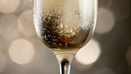 Canvas Print - Champagne glass filled with bubbling wine.