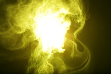 Poster - Artificial magic yellow light illuminates smoke on dark background