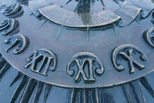 Details Of Big Decorative Street Clock. Concept Of The Time. Roman Numerals. Close Up Photography
