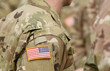 © Bumble Dee - US soldiers. US army. USA patch flag on the US military uniform. Veterans Day. Memorial Day.