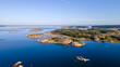 Swedish archipelago in Bohuslän with a blue sky in the background - Drone Perspective Landscape Photography