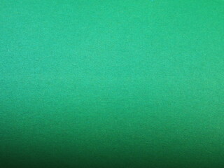 Wall Mural - green even texture of copy space, colored paper of emerald color with a textured surface, bright colored paper of mint shade