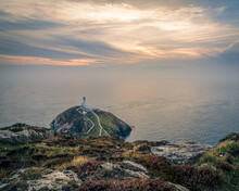 Sunset Over South Stack Lighthouse In Anglesey, North Wales