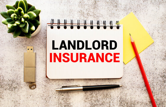 text LANDLORD INSURANCE on white paper, concept