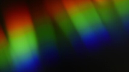 Wall Mural - Colorful rgb light lines move randomly on a black background. Iridescent refractions Light leaks for overlay effect. Multi-Colored Prism Light Flares .