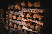 Wooden Natural Sawn Logs As Background, Top View, Flat Lay. Wood Texture. Firewood Stack. 