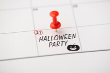 Above Photo Of Label Date 31 October With Inscription Halloween Party Red Pin And Pumpkin Isolated On The Calendar Background