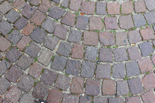 Old Cobblestone Pavement Close-up Background And Texture