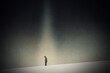 A mental health concept. Of a lonely figure walking in a dark minimal landscape. With a texture edit