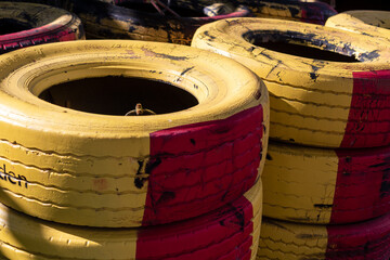 Poster - Closeup shot of car tires lined up a stack on top of each other