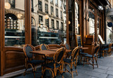 Fototapeta Uliczki - Typical view of the Parisian street with tables with tables of cafe in Paris, France. Architecture and landmark of Paris. Cozy Paris cityscape