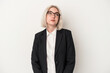 © Asier - Young caucasian business woman isolated on white background dreaming of achieving goals and purposes