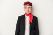 Young air hostess caucasian woman isolated on white background confused, feels doubtful and unsure.