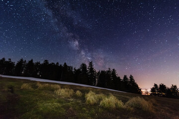 Wall Mural - bright starry sky with the milky way on the background of high tatras mountains