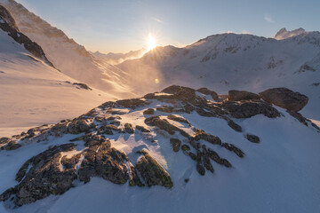 Wall Mural - beautiful winter views of the high tatra mountains with tourists, skiers and amazing states of natur