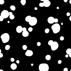 Wall Mural - Polka dot seamless pattern. White spots on black background. Hand drawn texture for print, textile, packaging.