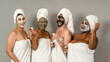 © Alessandro Biascioli - Happy multiracial women having skin care spa day - People selfcare concept