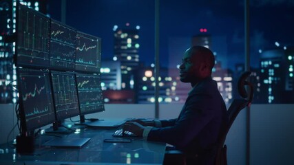 Poster - Stock Market Day Trader Working on Computer with Multi-Monitor Workstation with Real-Time Investmentment Charts. Successful African American Businessman Punches Air for Winning a Trade.