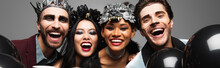 Happy Interracial Friends In Halloween Makeup Laughing At Camera Isolated On Grey, Banner