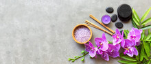 Thai Spa Treatments Aroma Therapy Salt And Sugar Scrub Massage With Purple Orchid Flower On Backboard With Candle. Thailand. Healthy Concept. Copy Space For Banner