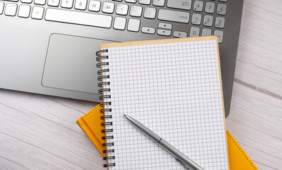 Poster - Office table with blank notebook and laptop , business concept