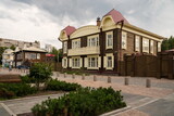 Fototapeta Sawanna - A residential house with a gate and an outbuilding at 11 Gorky Street, in the Historical Pedestrian Zone, built in 1910 for the family of the doctor Glanz.