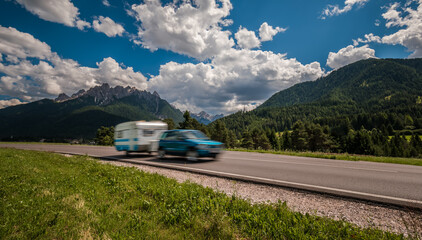 Wall Mural - Family vacation travel, holiday trip in motorhome RV, caravan car motion blur