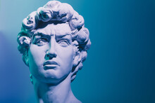 Gypsum Copy Of The Sculpture David Michelangelo On Blue Background