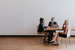 © Rawpixel.com - Business people discussing in a meeting room