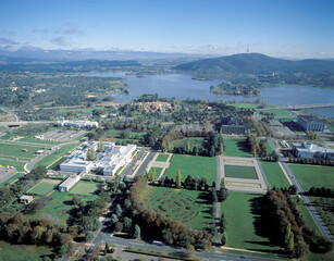 Wall Mural - Aerial view of the city of Canberra showing the old Parliament house and Lake Burley Griffin...