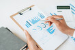 © PaeGAG - businessman working data document graph chart report marketing research development planning management strategy analysis financial accounting. Business office concept.