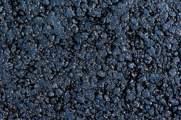 Wall Mural - asphalt texture background. high resolution clean grain asphalt texture close-up. new road surface texture detail closeup