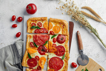 Wall Mural - Delicious homemade square pizza with vegetables on white