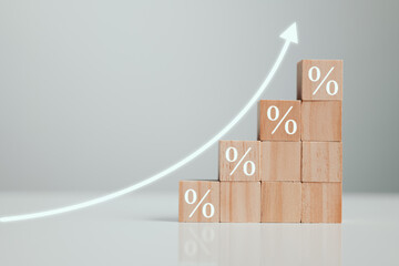 Aufkleber - Interest rate financial and mortgage rates concept. The economy is improving. Wooden blocks with Icon percentage symbol and arrow pointing up.