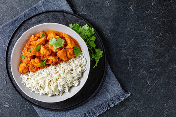 butter chicken, curry of spicy chicken with rice