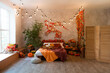 © sergiophoto - Autumn bedroom, living room interior. Red and yellow leaves and flowers in the vase and pumpkin on light background.