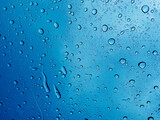 Fototapeta Natura - water on mirror, rainy day, abstract background

