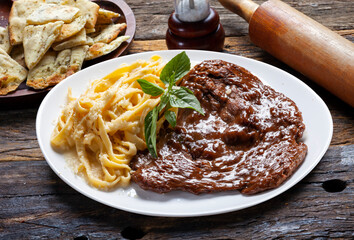 Sticker - Roasted steak with sauce and pasta