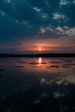 Vertical Shot Of A Beautiful Sunset Behind The Dal Lake In Srinagar, India