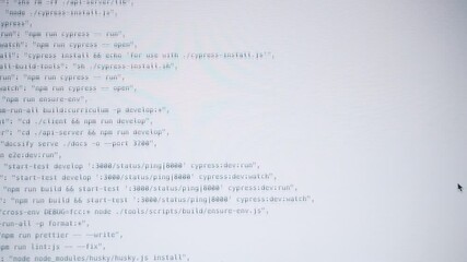 Wall Mural - computer code running over white screen of laptop