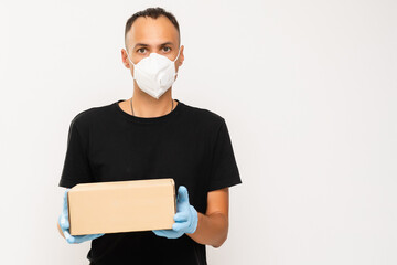 Wall Mural - Delivery man hold cardboard box isolated on white background