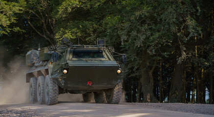  British army Patria Pasi Fuchs (Falcon Squadron) CBRN six-wheeled armoured personnel carrier vehicle on a military battle exercise, Wiltshire UK