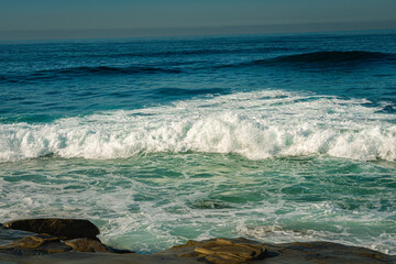 Wall Mural - 2021-09-21 WAVES AND SURF APPROACHING THE ROCKS IN LA JOLLA CALIFORNIA