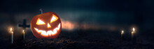 Pumpkin Jack O 'Lantern With Spooky Glowing Eyes On Halloween Night
