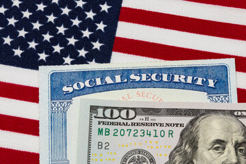 Wall Mural - Social security card, 100 dollar bill and American flag. Concept of social security benefits payment, retirement and federal government benefits