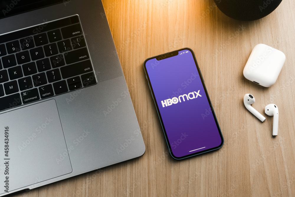 Hbo Max app on the smartphone screen on wooden background with a ...