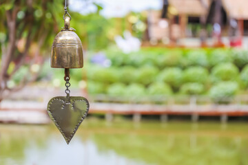 Wall Mural - Bronze bell or brass bell in Thailand temple in the  blur background