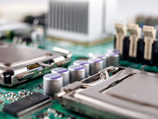 Solid-state capacitors on the motherboard of a desktop personal computer, server computer, electric batteries, computer repair, selective focus