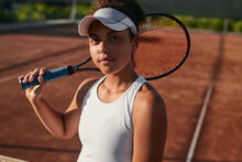 Teenage Tennis Player On Court